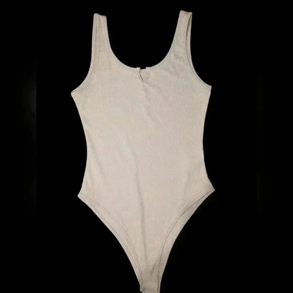 *3 for $25* 4 Medium women bodysuits - Picture 2 of 4